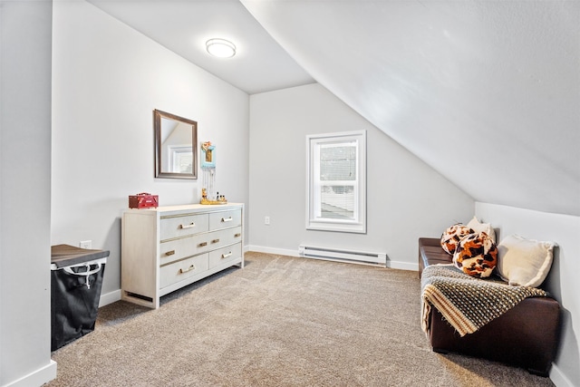 sitting room featuring a baseboard radiator, lofted ceiling, and carpet