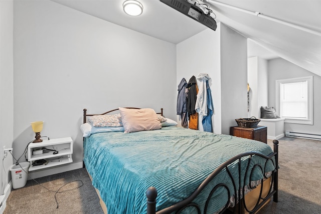 bedroom featuring a baseboard heating unit and carpet