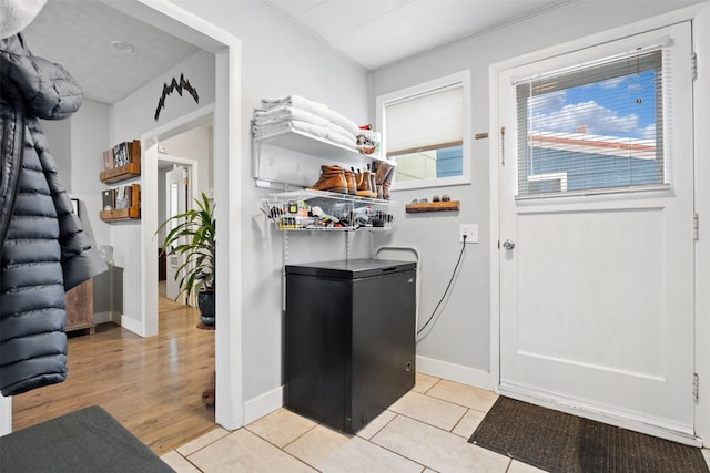 interior space featuring light tile patterned floors