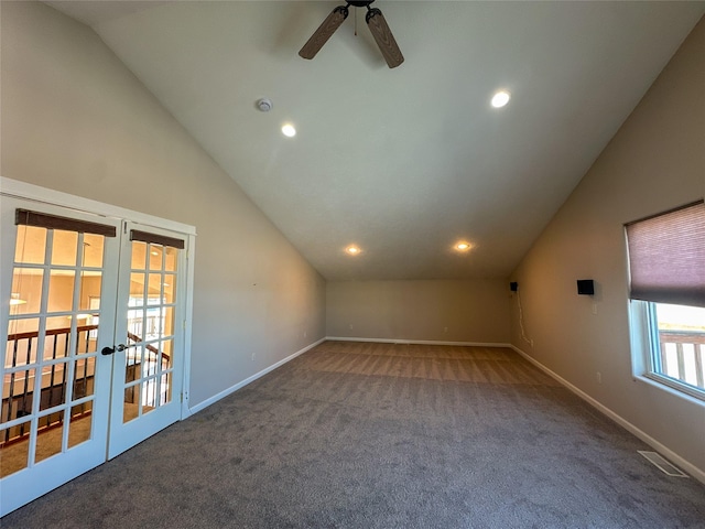 bonus room with carpet, lofted ceiling, and french doors