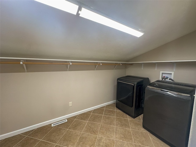 laundry area featuring independent washer and dryer