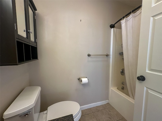 bathroom with shower / bath combo, toilet, and tile patterned floors