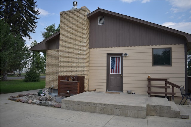 rear view of house with a patio