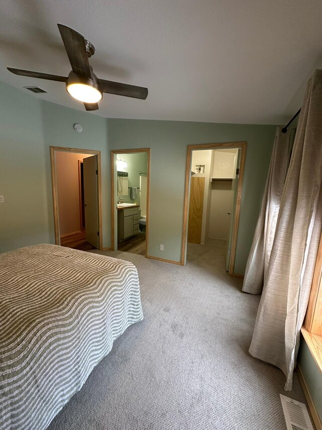 bedroom with vaulted ceiling and ceiling fan