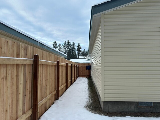 view of snow covered house