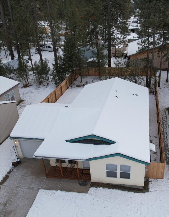 view of snow covered property