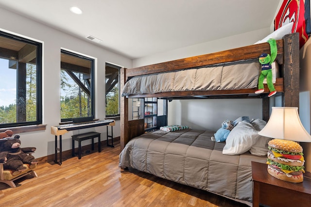 bedroom featuring light hardwood / wood-style floors