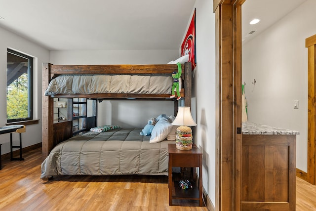 bedroom featuring light wood-type flooring