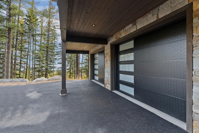 view of patio / terrace featuring a garage