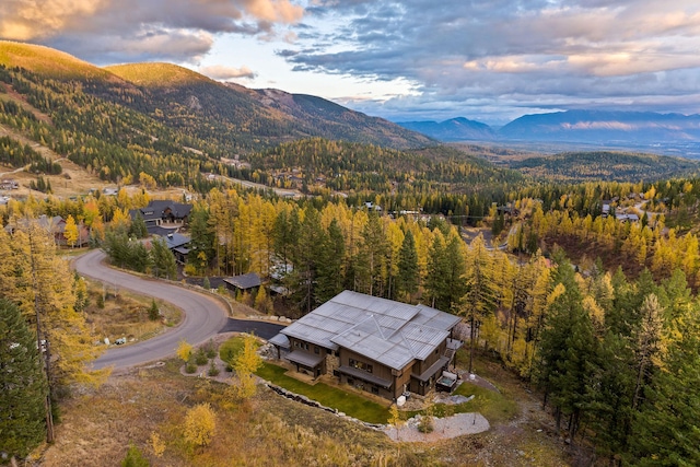 aerial view at dusk with a mountain view