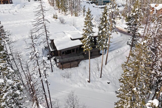 snowy aerial view featuring a mountain view