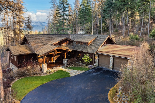 log cabin with a garage