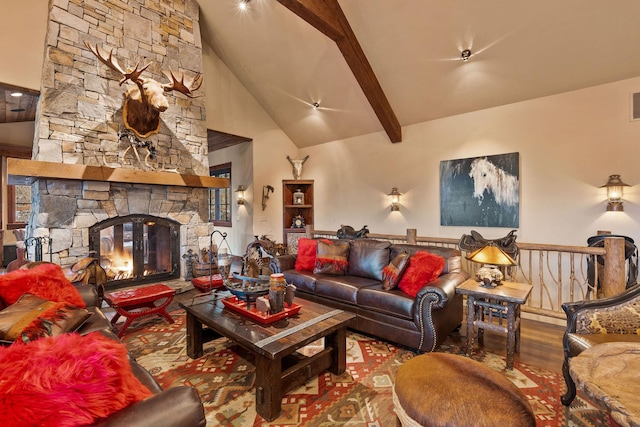 living room with high vaulted ceiling, wood-type flooring, beamed ceiling, and a fireplace