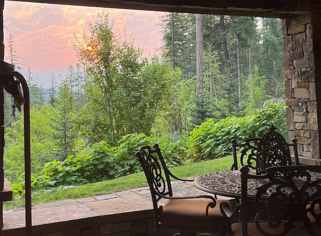 view of patio terrace at dusk