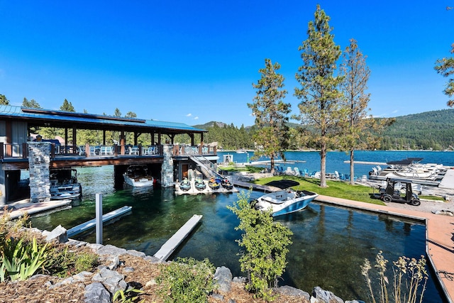 view of dock with a water view