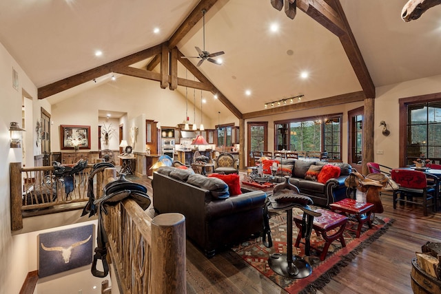 living room featuring ceiling fan, beamed ceiling, dark hardwood / wood-style floors, and high vaulted ceiling