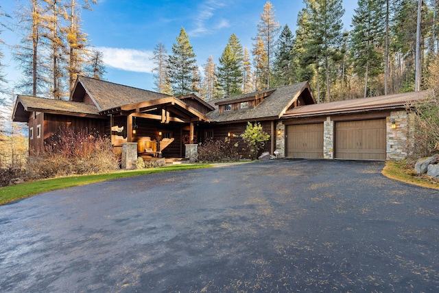 view of front of home with a garage