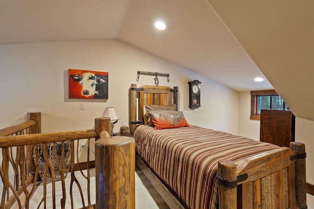 bedroom featuring vaulted ceiling