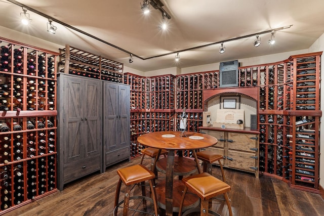 wine room featuring hardwood / wood-style floors