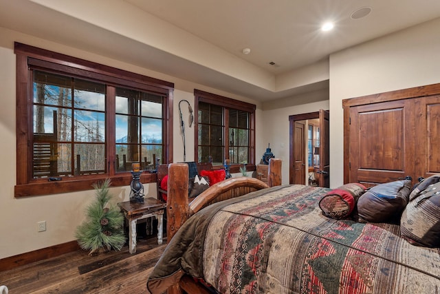 bedroom with wood-type flooring