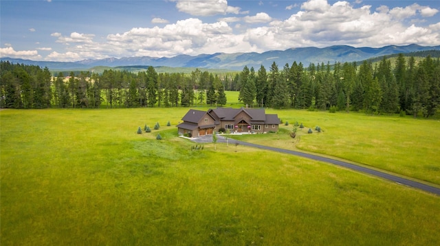 bird's eye view featuring a mountain view and a rural view