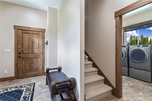 foyer with separate washer and dryer