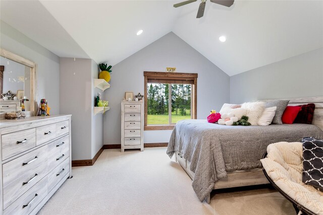 carpeted bedroom with lofted ceiling