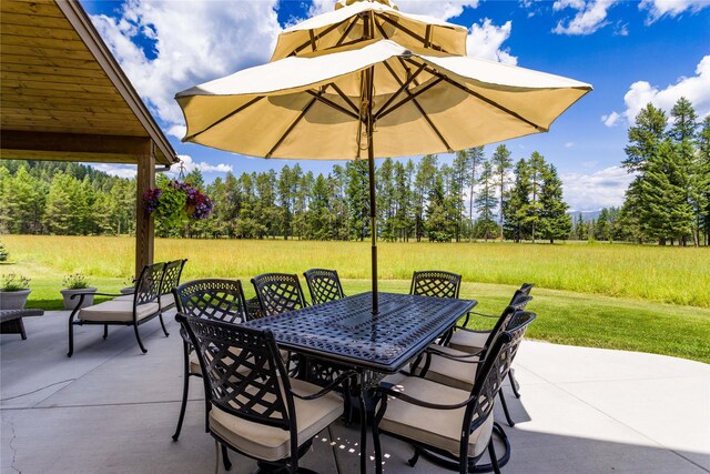 view of patio / terrace featuring an outdoor fire pit and a grill