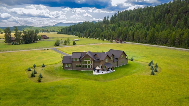 bird's eye view with a mountain view and a rural view