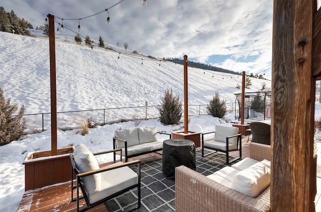 view of snow covered patio