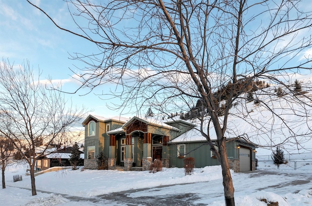 view of front of property with a garage