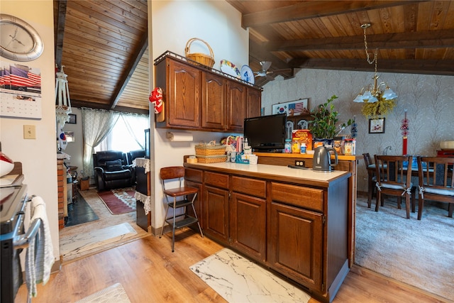 kitchen with wood ceiling, light countertops, vaulted ceiling with beams, and light wood finished floors