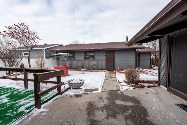 view of front of property with fence