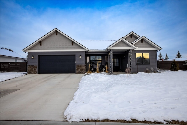 view of front of property with a garage