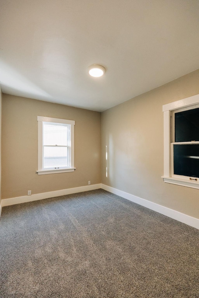 view of carpeted spare room