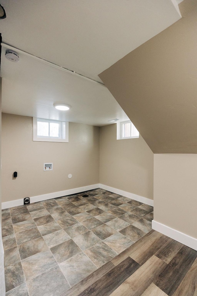 basement featuring plenty of natural light