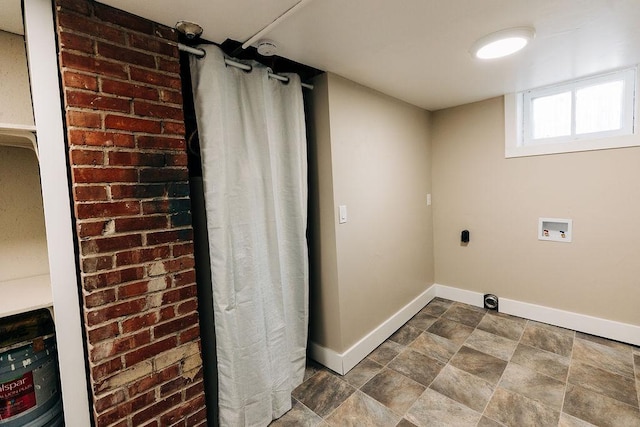 laundry room featuring hookup for a washing machine and hookup for an electric dryer