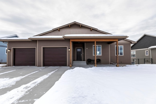 view of front of property with a garage