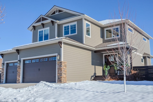 craftsman house with a garage