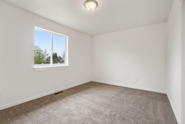 empty room with carpet floors