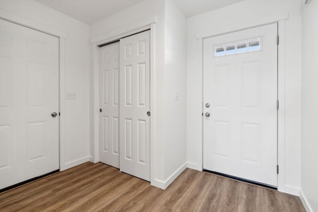 entrance foyer featuring hardwood / wood-style floors