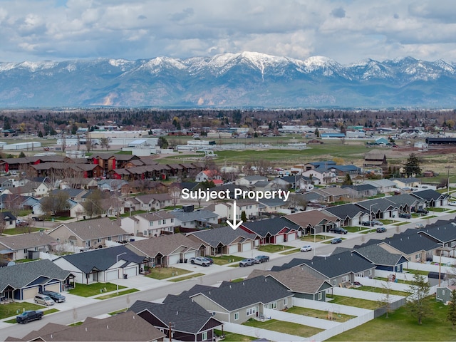 aerial perspective of suburban area with mountains