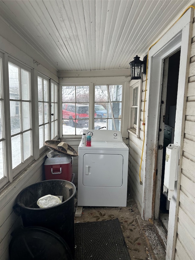 laundry room featuring washer / clothes dryer and wood ceiling