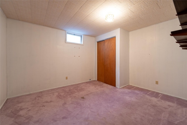 basement featuring carpet