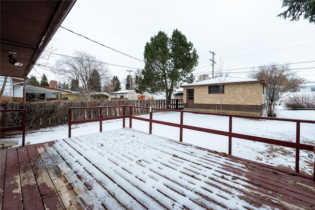 view of snow covered deck