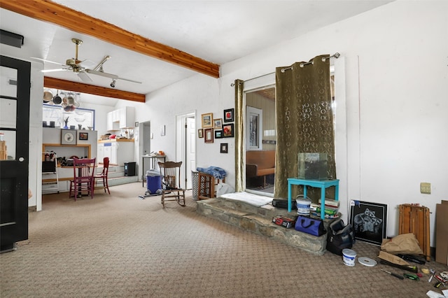 misc room featuring beamed ceiling, ceiling fan, carpet flooring, and track lighting