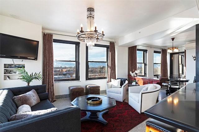 carpeted living room featuring a wall mounted AC and an inviting chandelier