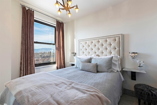 bedroom with an inviting chandelier