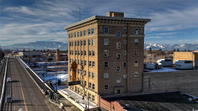 view of building exterior with a mountain view