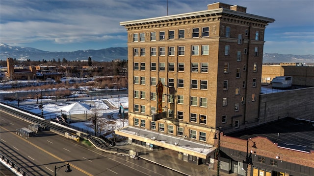 view of building exterior featuring a mountain view